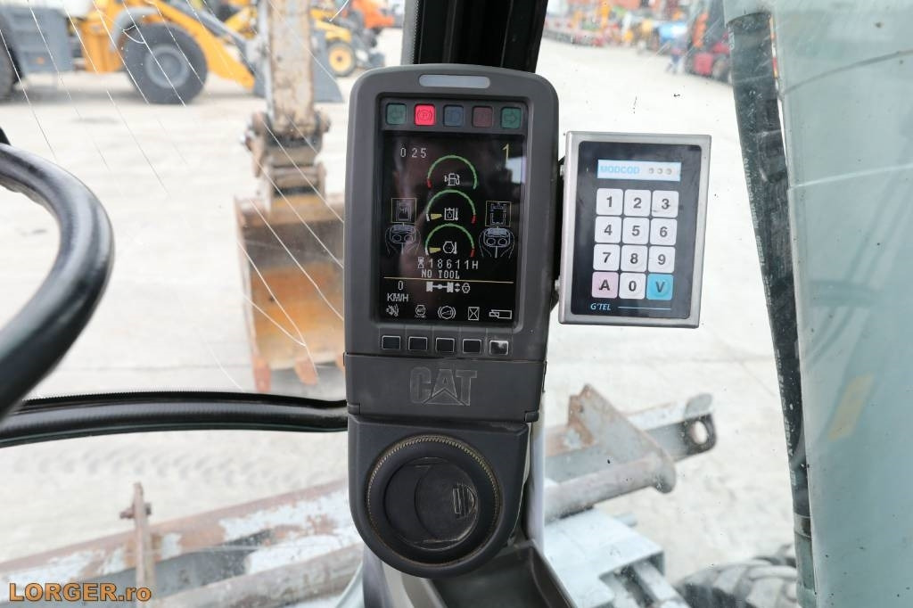 Wheel excavator CAT M 313 D: picture 16