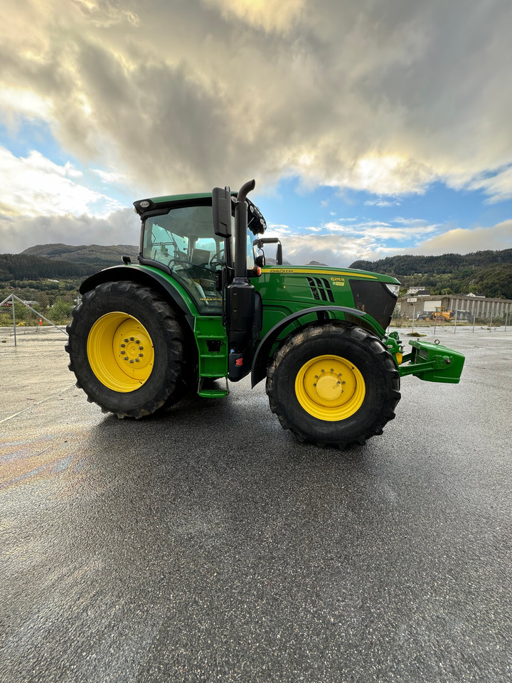 Farm tractor John Deere 6215R: picture 6