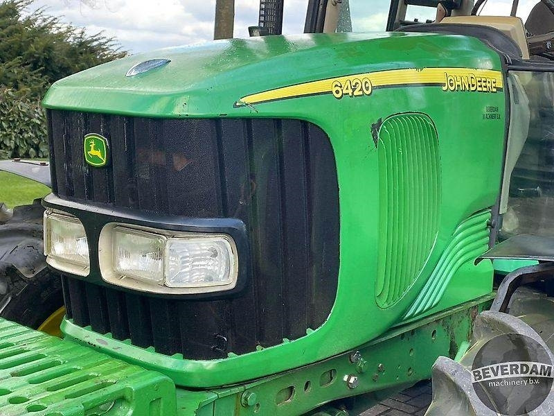 Farm tractor John Deere 6420: picture 14